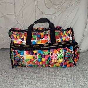 Lesportsac weekender bag candy collection in great condition!!